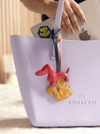 Red Dachshund Bag Charm styled on a Cohito bag