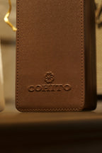 Embossed Cohito logo on the brown EVA bottle holder
